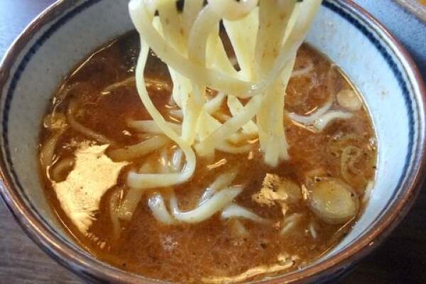 伊吹のつけ麺のスープの写真