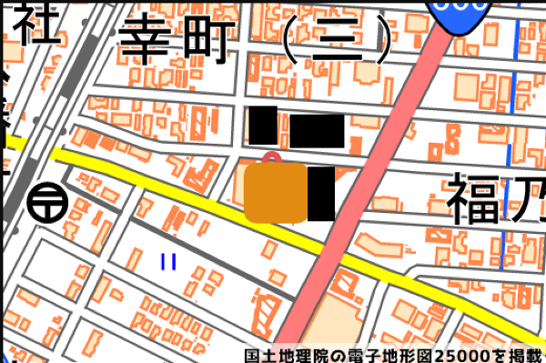 お店の駐車場と地図の写真