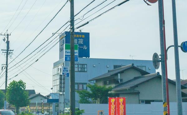 ファミリーマート美濃加茂田島一丁目店の看板の写真
